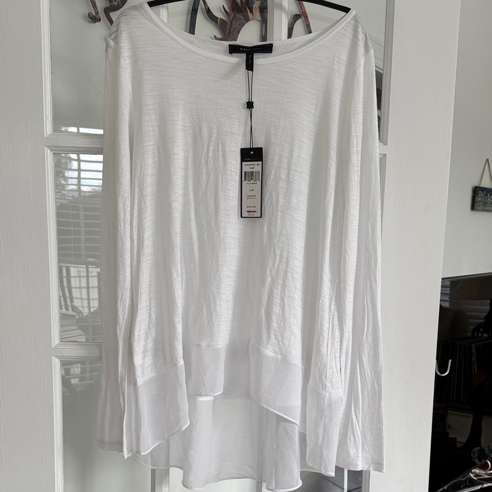 BCBGMaxAzria white long sleeve top with high-low hem trimmed in chiffon NWT